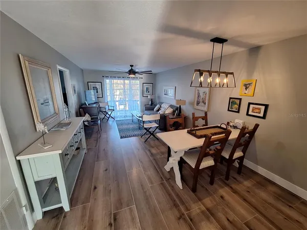 a view of a livingroom and dining room