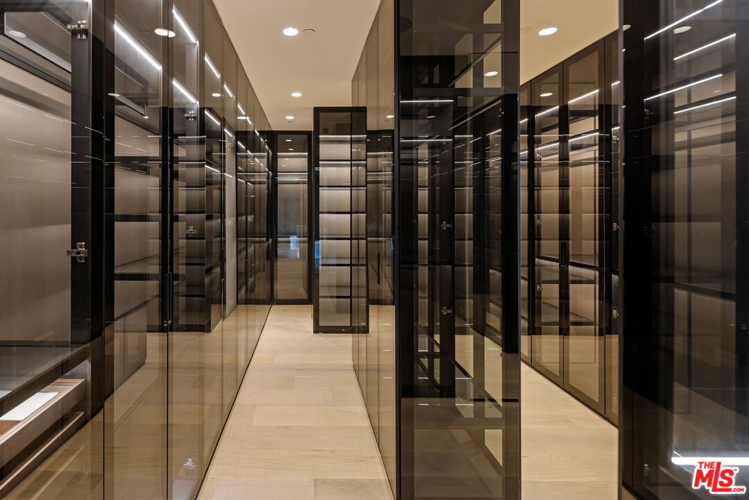 2180 1/2 Stradella Road Los Angeles, CA 90077 - Photo 14 of 21 a view of gallery with a glass door