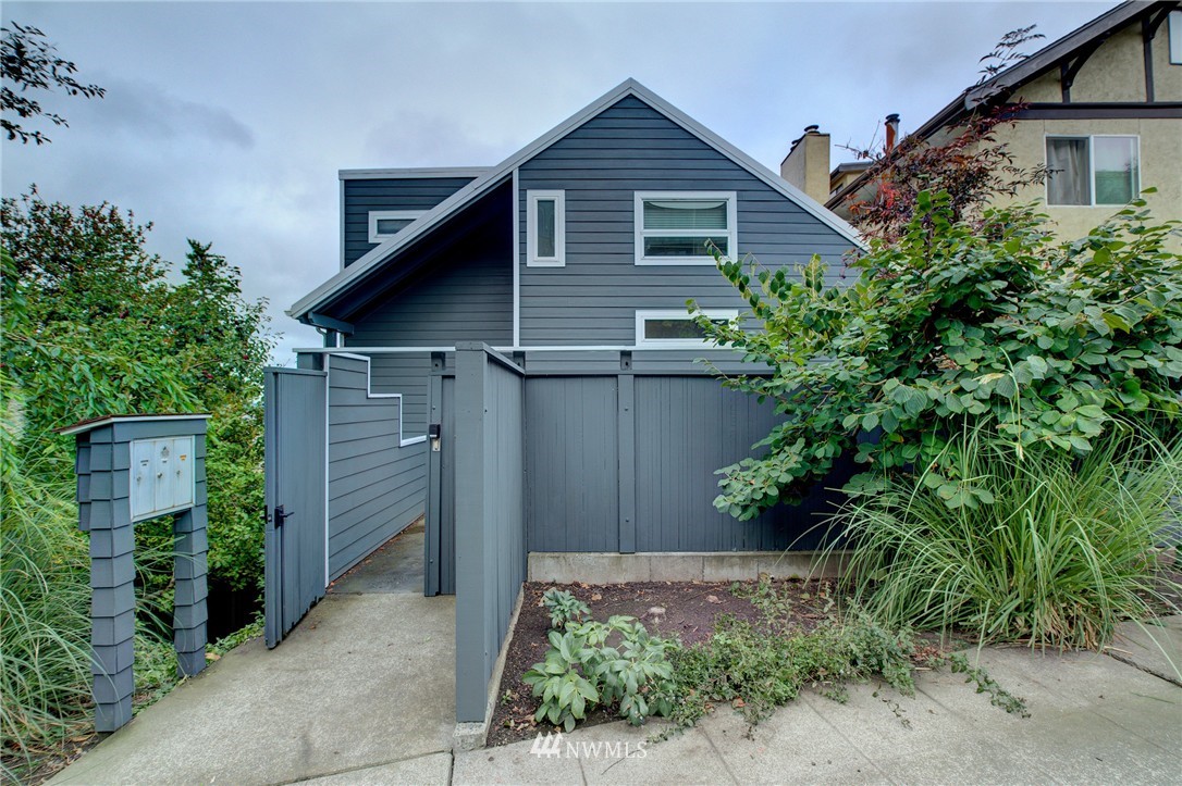 1909 Broadway East Seattle, WA 98102 - Photo 1 of 25 a front view of a house with plants