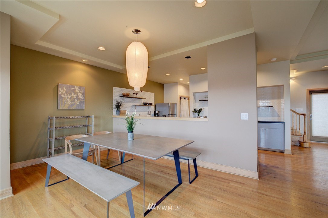 1909 Broadway East Seattle, WA 98102 - Photo 11 of 25 a living room with furniture and a wooden floor