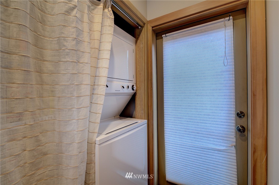 1909 Broadway East Seattle, WA 98102 - Photo 17 of 25 a bathroom with a shower and a toilet