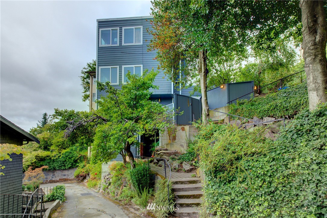 1909 Broadway East Seattle, WA 98102 - Photo 3 of 25 a view of a house with a tree