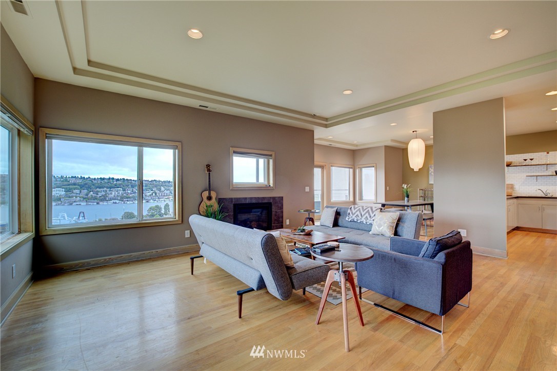 1909 Broadway East Seattle, WA 98102 - Photo 5 of 25 a living room with furniture and a large window