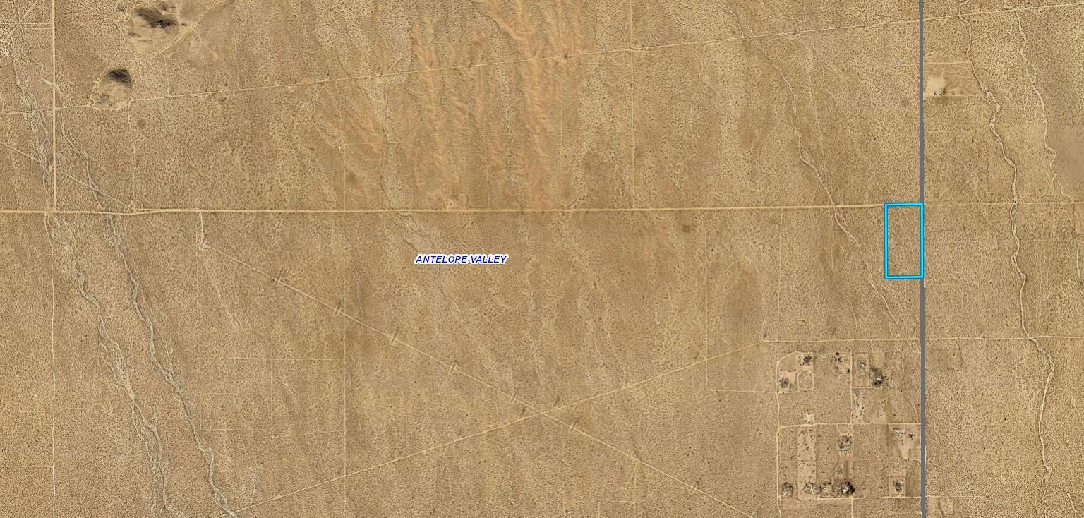 263 Cor Avenue Llano, CA 93544 - Photo 3 of 7 a bathroom with a shower curtain