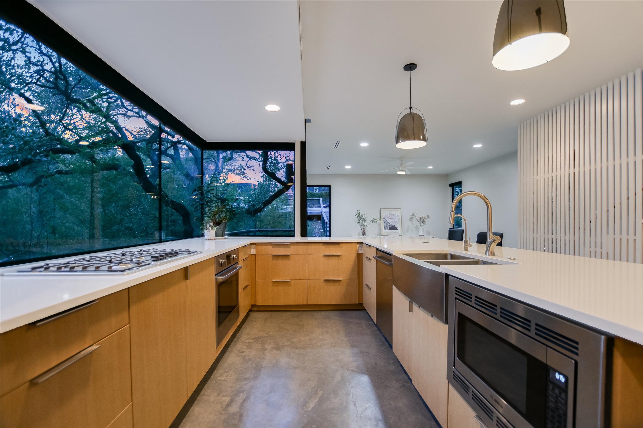 1325 Bonham Terrace, Unit A Austin, TX 78704 - Photo 1 of 25 a large kitchen with stainless steel appliances a stove and a large window
