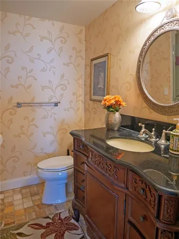 a bedroom with a bed and a dresser in it