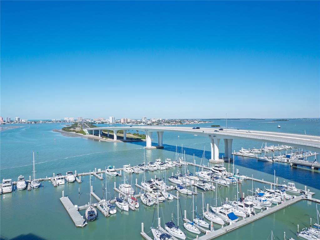 100 Pierce Street, Unit 1301 Clearwater, FL 33756 - Photo 39 of 44 a view of a lake with a house in the background