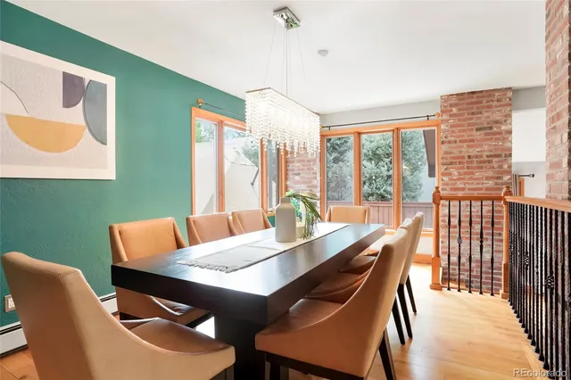 a view of a dining room with furniture window and outside view