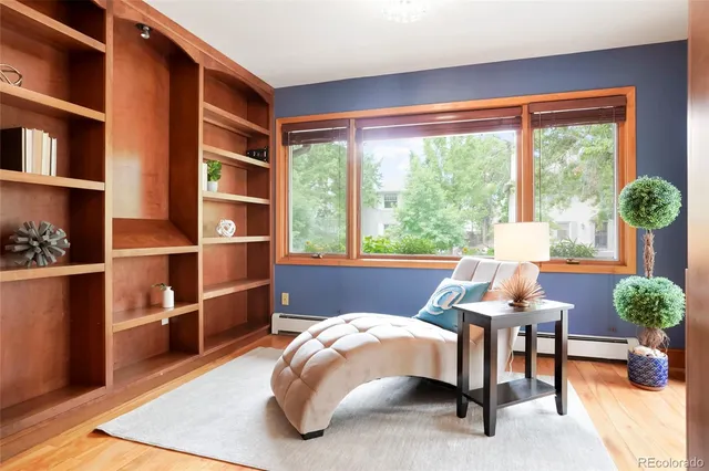 a bed room with a bed and a window