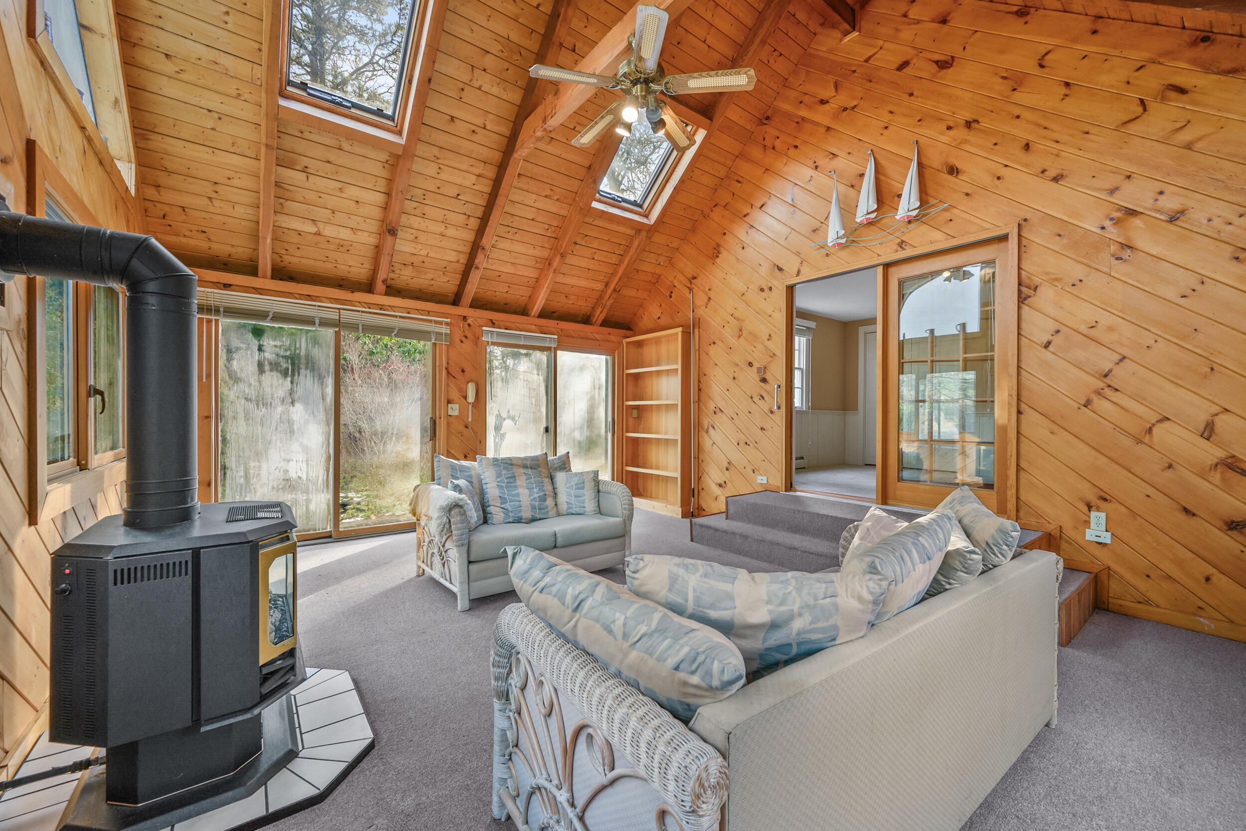 3 Nickerson Road Orleans, MA 02653 - Photo 16 of 30 a living room with furniture and large windows
