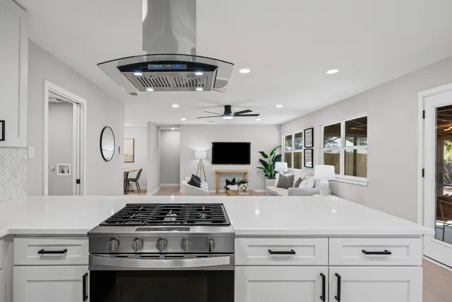 a bathroom with a double vanity sink mirror double and shower