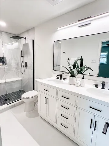 a bathroom with a bathtub and a shower