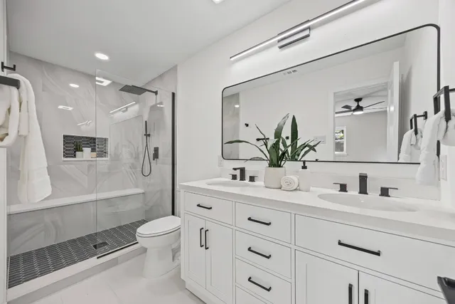 a outdoor living room with furniture and a window