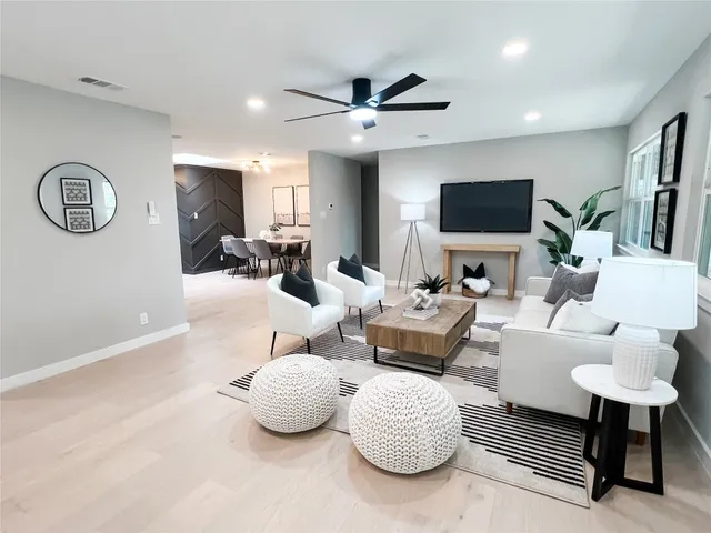 a kitchen with cabinets stainless steel appliances and a sink