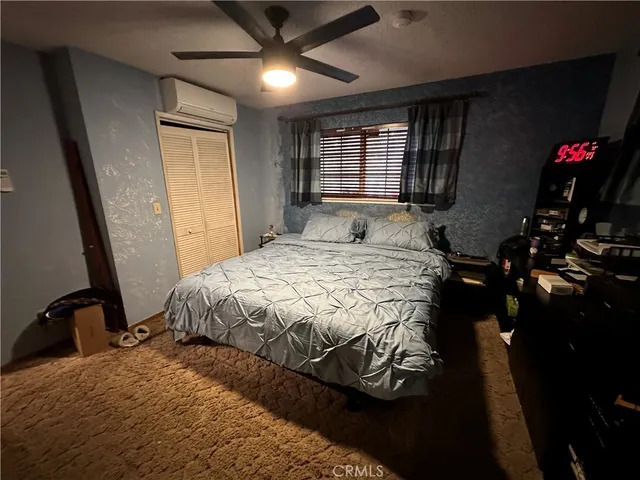 a view of living room with furniture and a flat screen tv