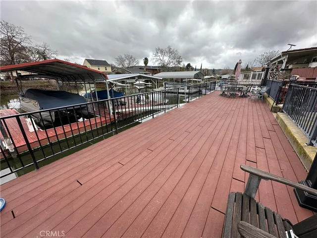 a view of a balcony with wooden floor