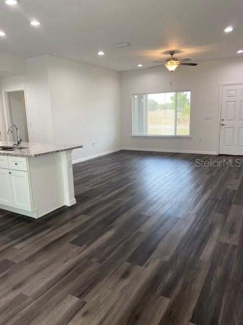40 Maple Lane Ocklawaha, FL 32179 - Photo 24 of 50 an empty room with wooden floor and window