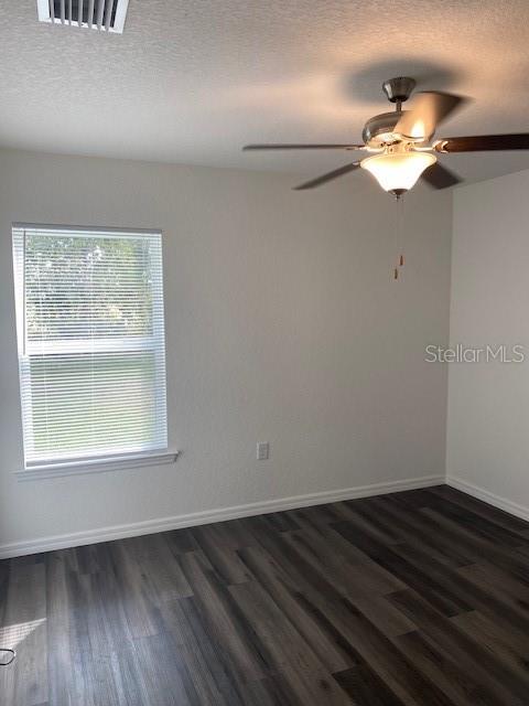 40 Maple Lane Ocklawaha, FL 32179 - Photo 29 of 50 wooden floor in an empty room with a window
