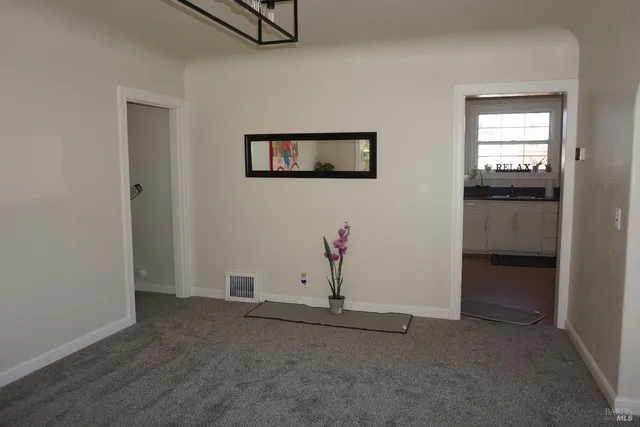 a view of a room with racks on the wall