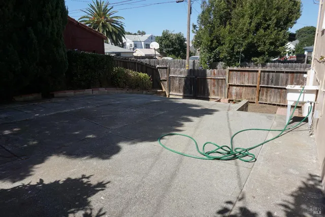 a view of backyard with green space