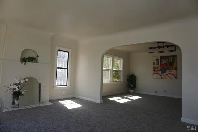 a view of empty room with windows