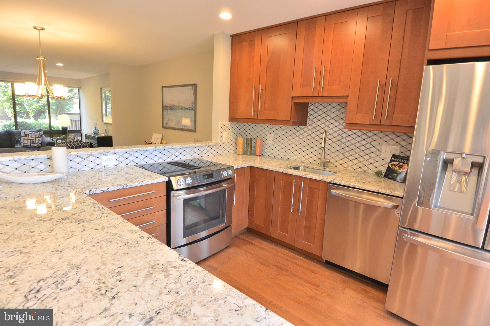 2031 Lakewinds Drive Reston, VA 20191 - Photo 10 of 38 Kitchen overlooking Dining Room
