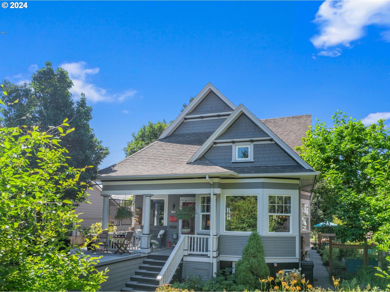 a front view of a house with yard