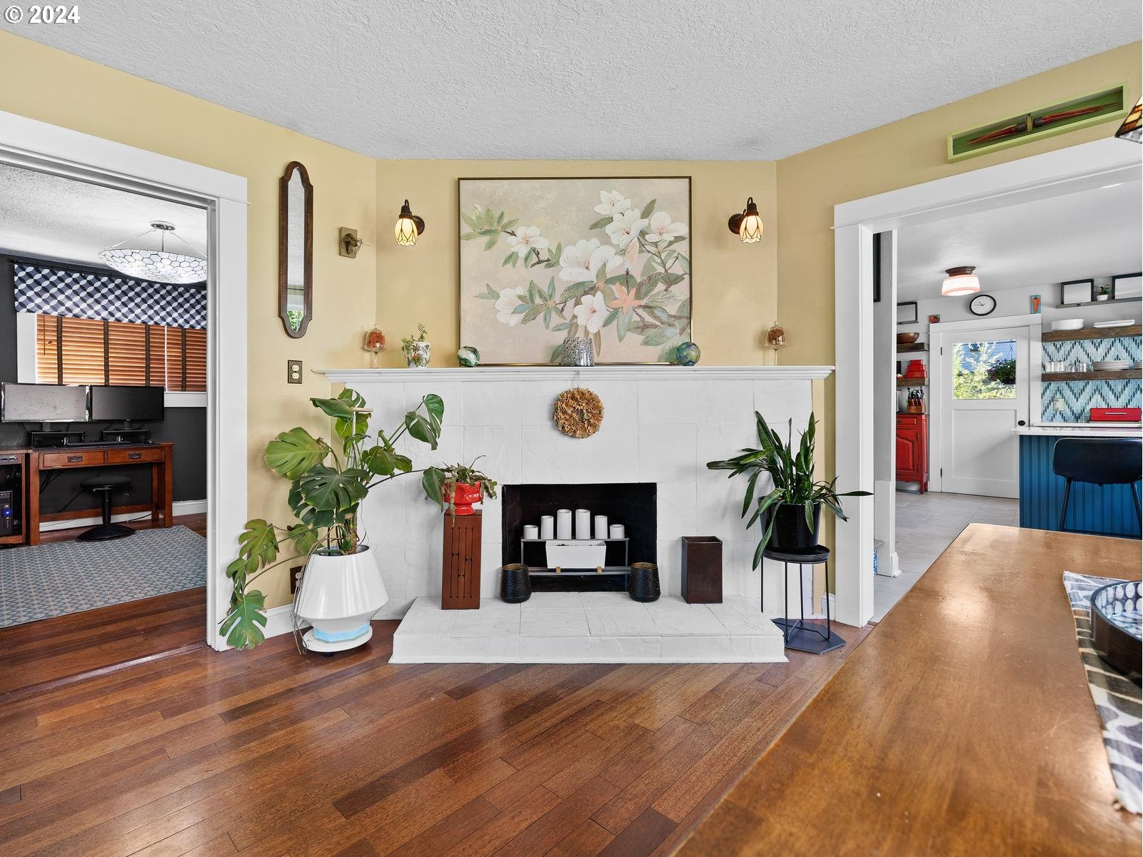 2306 Northeast Couch Street Portland, OR 97232 - Photo 12 of 48 a living room with furniture and a fireplace