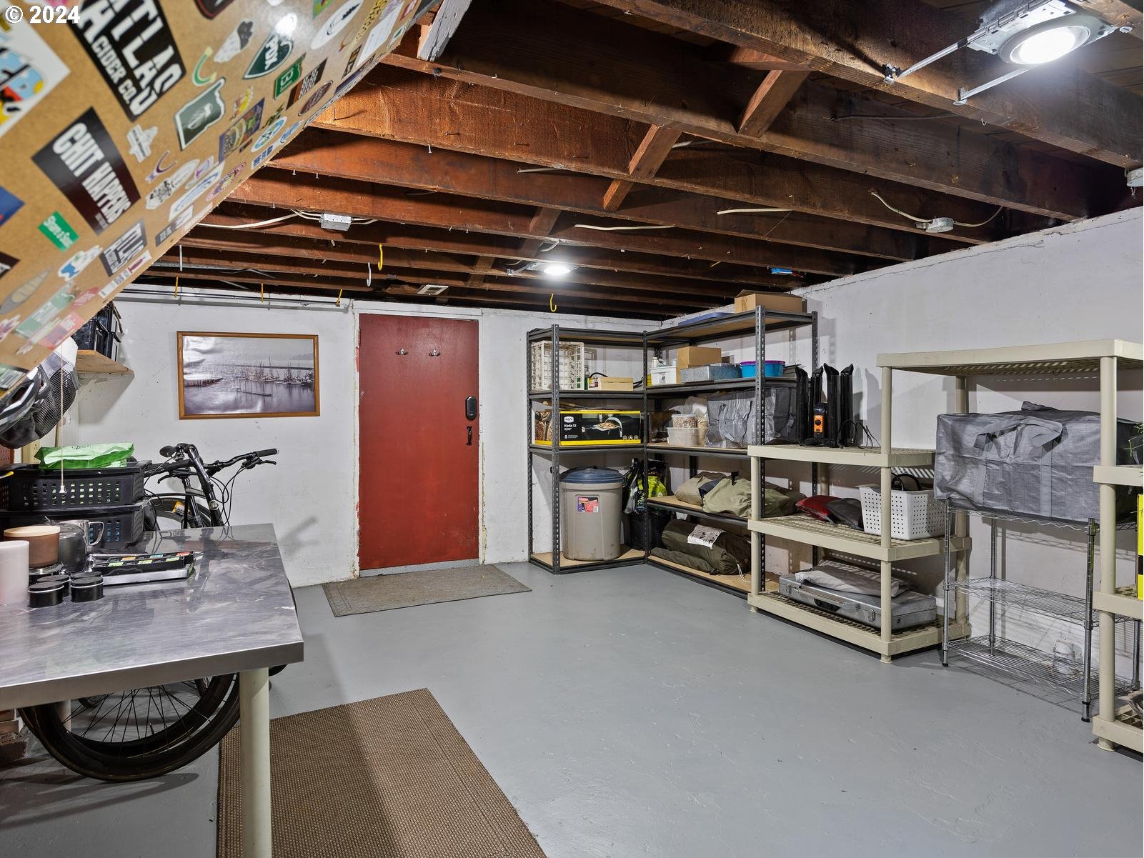 2306 Northeast Couch Street Portland, OR 97232 - Photo 38 of 48 a view of a storage room with a table and chairs