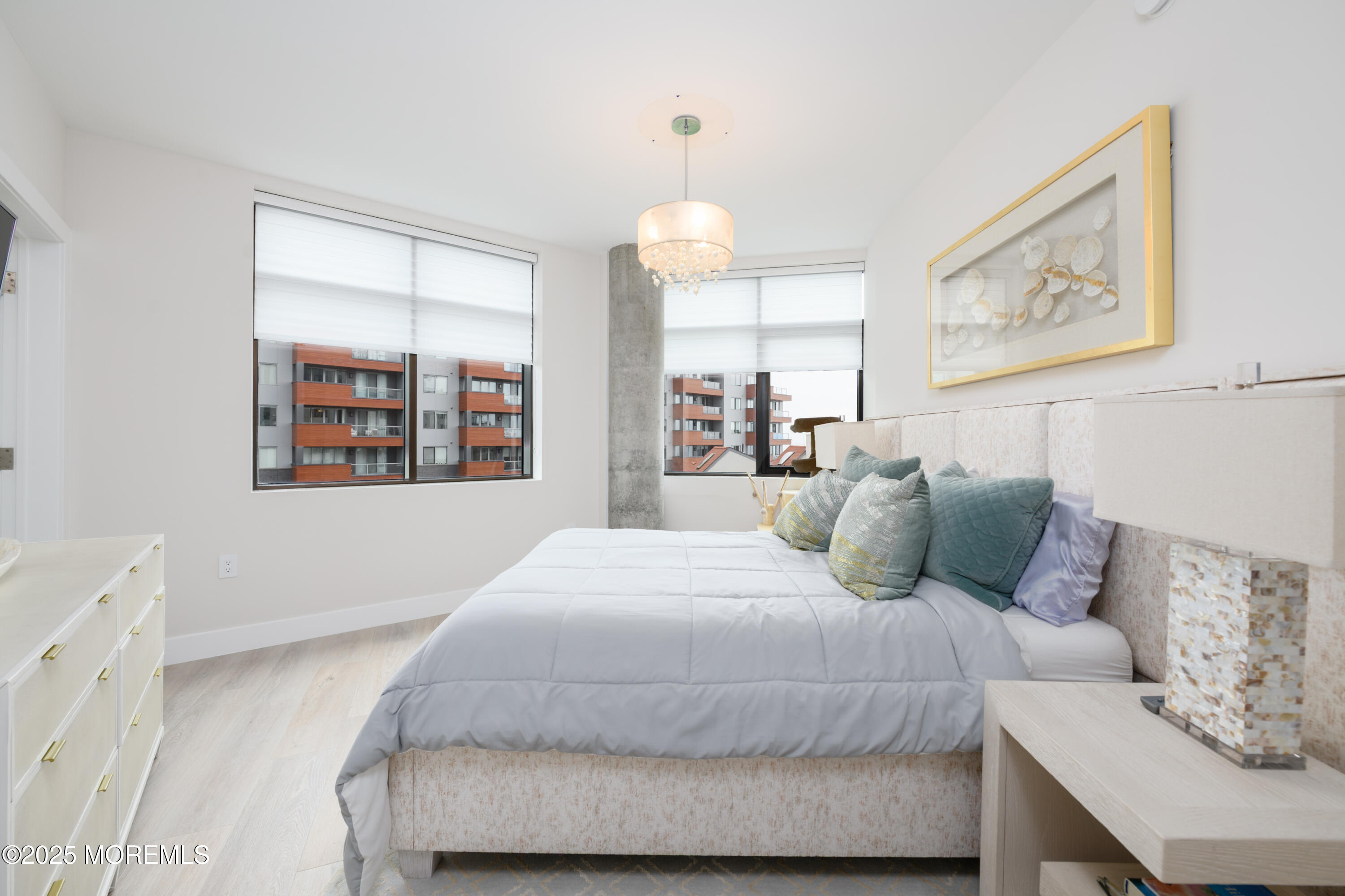 350 Ocean Avenue, Unit 403 Long Branch, NJ 07740 - Photo 12 of 23 a bedroom with a bed and a window