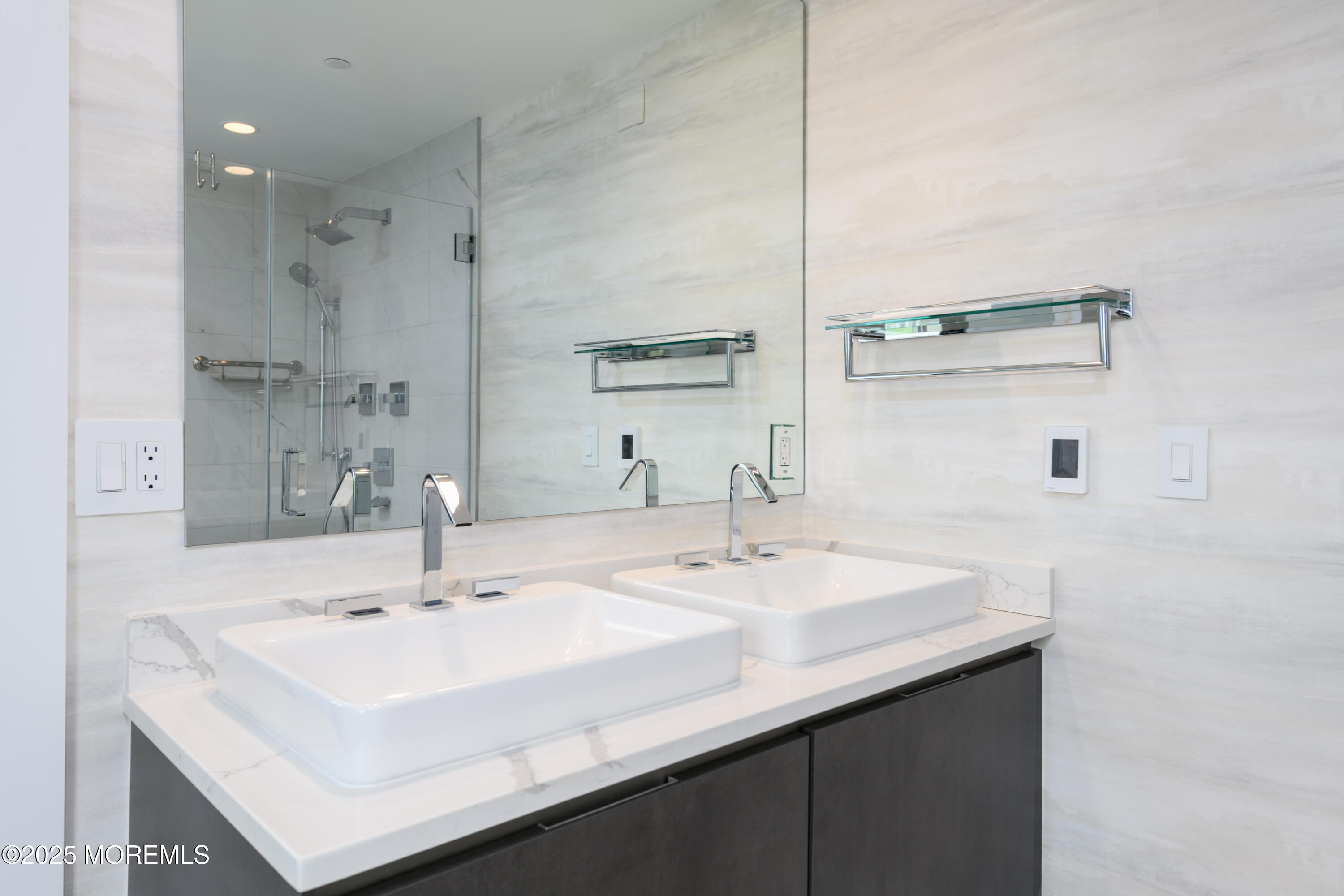 350 Ocean Avenue, Unit 403 Long Branch, NJ 07740 - Photo 14 of 23 a bathroom with a sink and a mirror