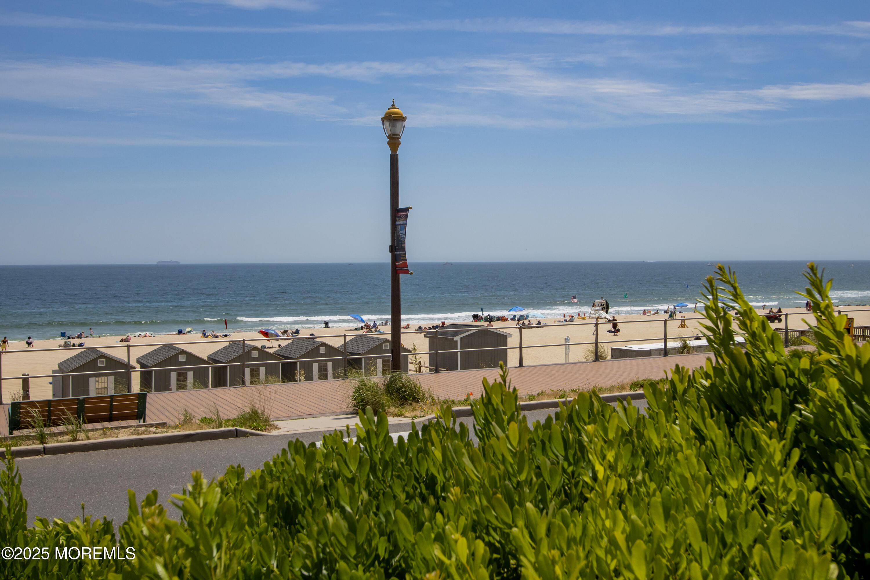 350 Ocean Avenue, Unit 403 Long Branch, NJ 07740 - Photo 23 of 23 a view of a ocean with a large building in the background