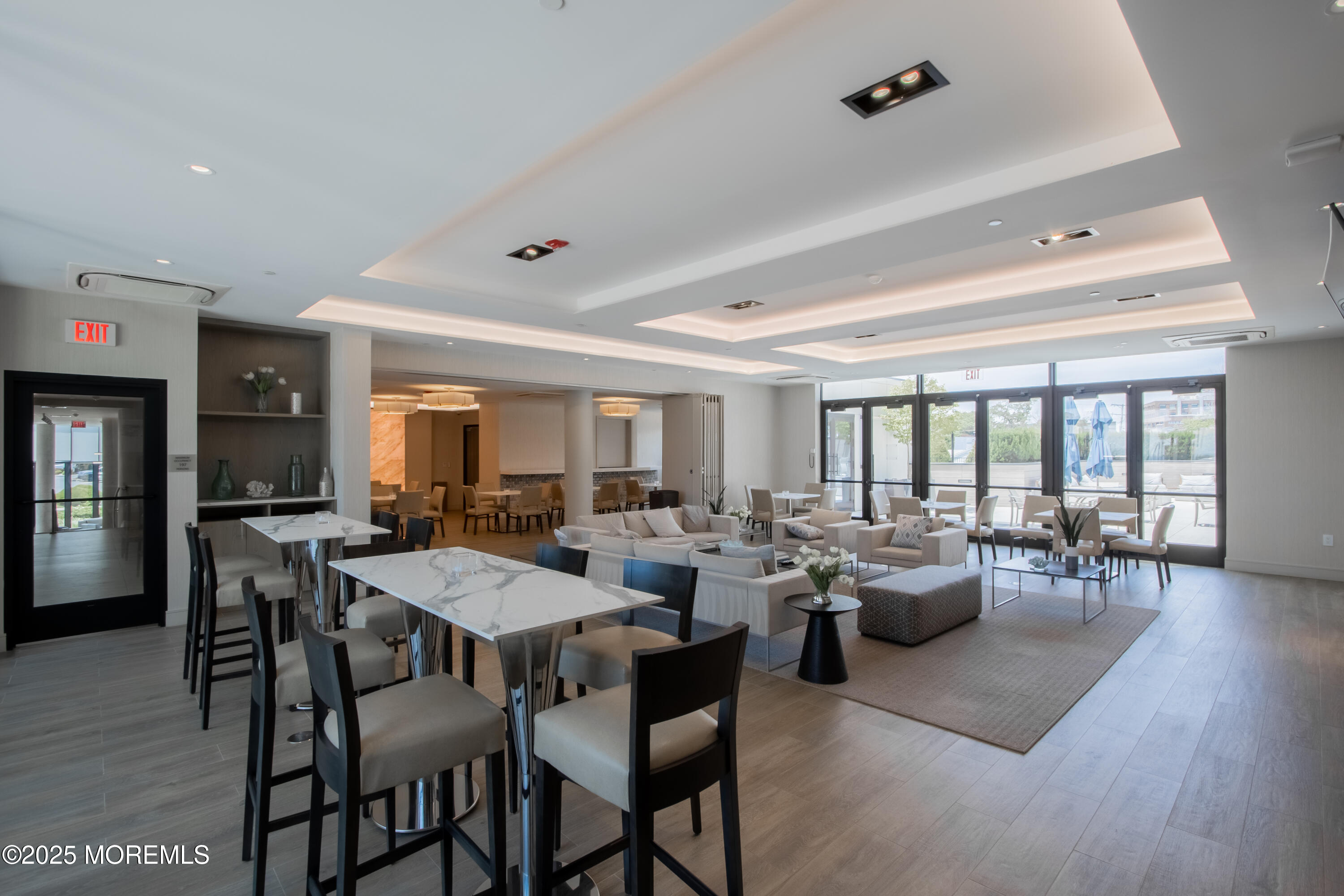 350 Ocean Avenue, Unit 403 Long Branch, NJ 07740 - Photo 5 of 23 a view of a dining room with furniture window and outside view