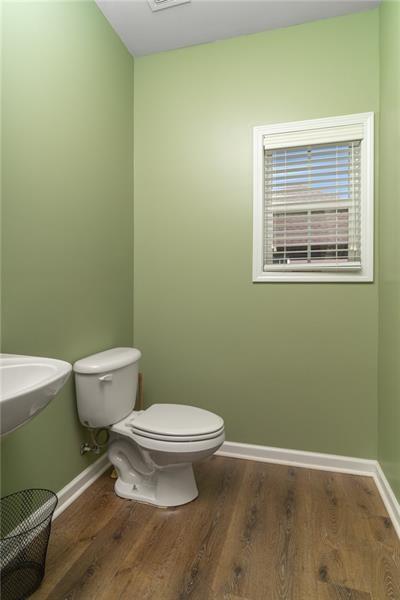 206 Sawtooth Court Canton, GA 30114 - Photo 15 of 42 a bathroom with a toilet and a sink