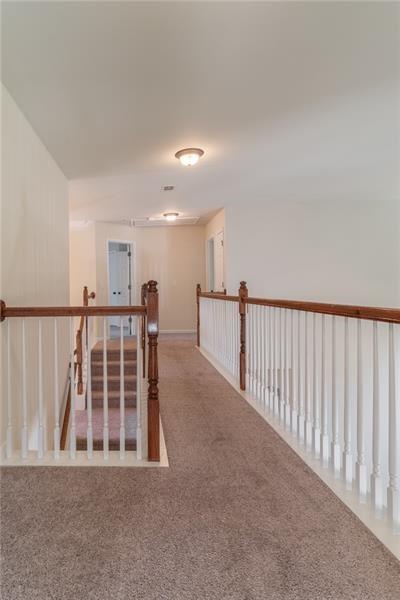 206 Sawtooth Court Canton, GA 30114 - Photo 16 of 42 a view of staircase with wooden floor