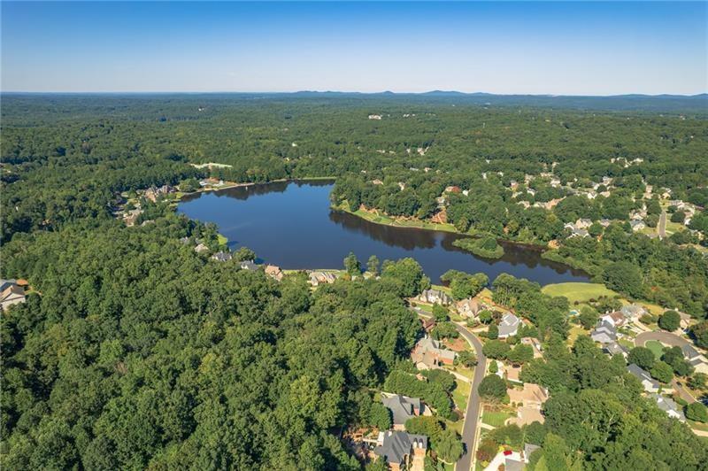 206 Sawtooth Court Canton, GA 30114 - Photo 42 of 42 a view of a lake with a city