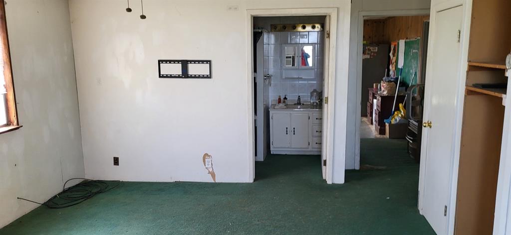 2846 County Road 2415 Pickton, TX 75471 - Photo 17 of 23 a view of a hallway with closet