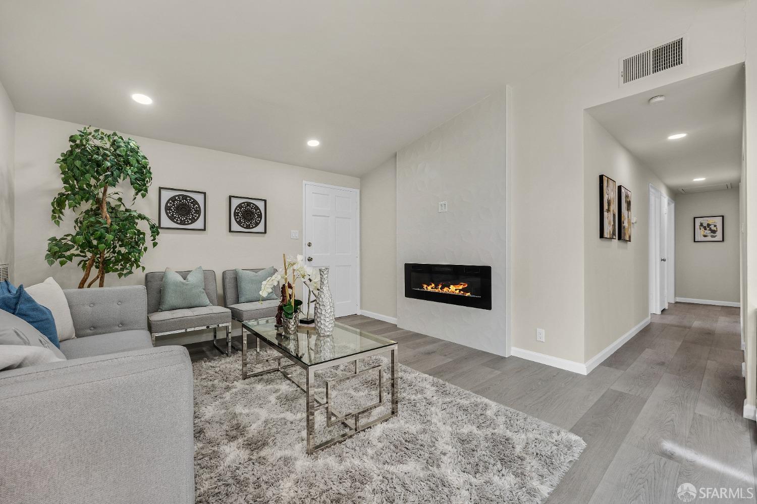 2625 Kavanagh Road San Pablo, CA 94806 - Photo 13 of 45 a living room with furniture and a fireplace