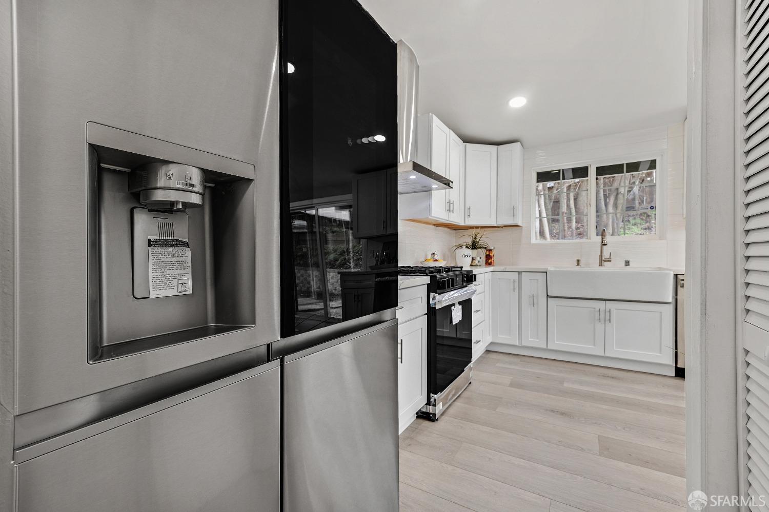 2625 Kavanagh Road San Pablo, CA 94806 - Photo 17 of 45 a kitchen with granite countertop white cabinets and white appliances