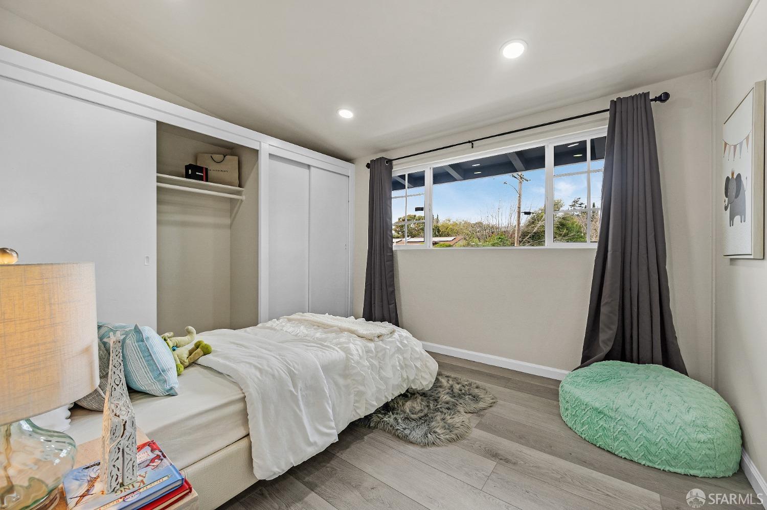 2625 Kavanagh Road San Pablo, CA 94806 - Photo 18 of 45 a bedroom with a bed and a window