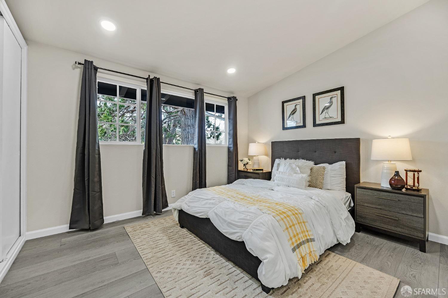 2625 Kavanagh Road San Pablo, CA 94806 - Photo 20 of 45 a bedroom with a large bed and a window