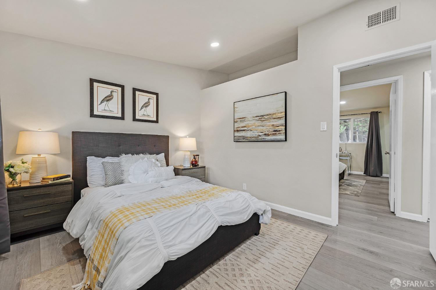 2625 Kavanagh Road San Pablo, CA 94806 - Photo 22 of 45 a bedroom with a bed and a painting