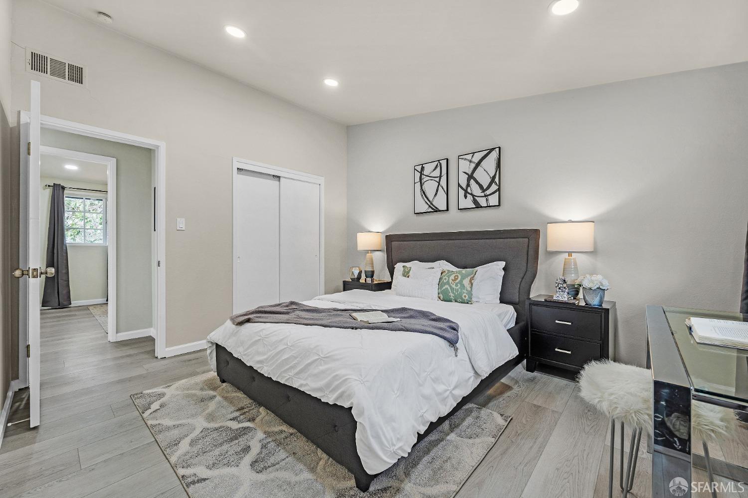 2625 Kavanagh Road San Pablo, CA 94806 - Photo 25 of 45 a bedroom with a bed and a table