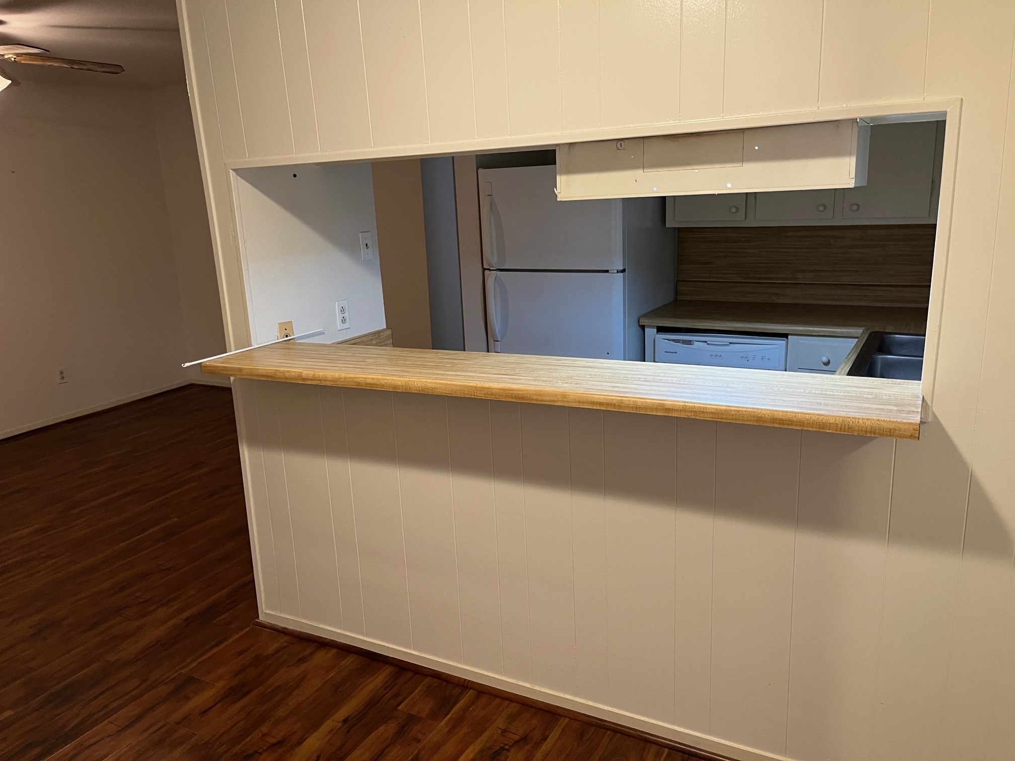 3938 West Alabama Street, Unit 12 Houston, TX 77027 - Photo 8 of 25 Breakfast bar pass-through connecting the kitchen & main living area.