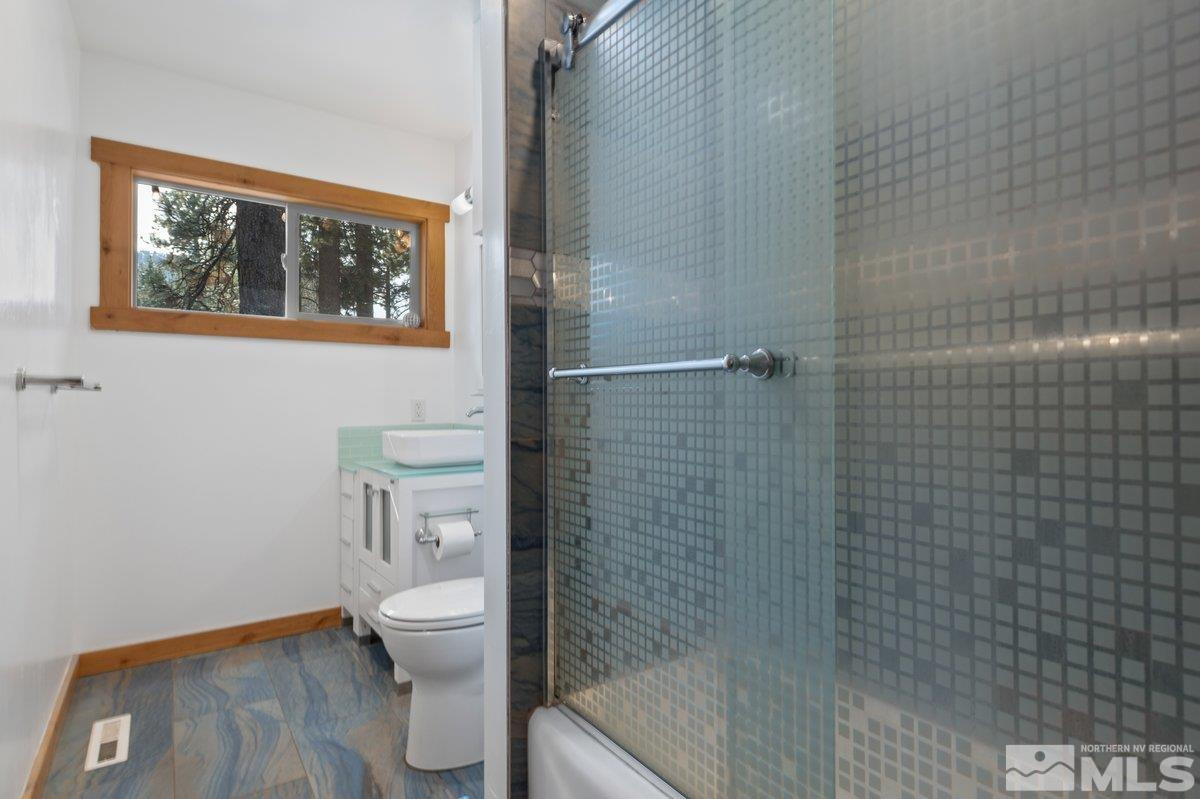 190 Meadow Drive Stateline, NV 89449 - Photo 15 of 26 a bathroom with a toilet and a shower