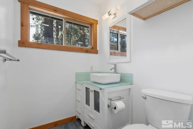 a bathroom with a sink and a toilet