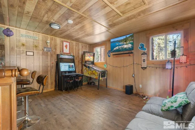 a kitchen with stainless steel appliances granite countertop a stove and a refrigerator