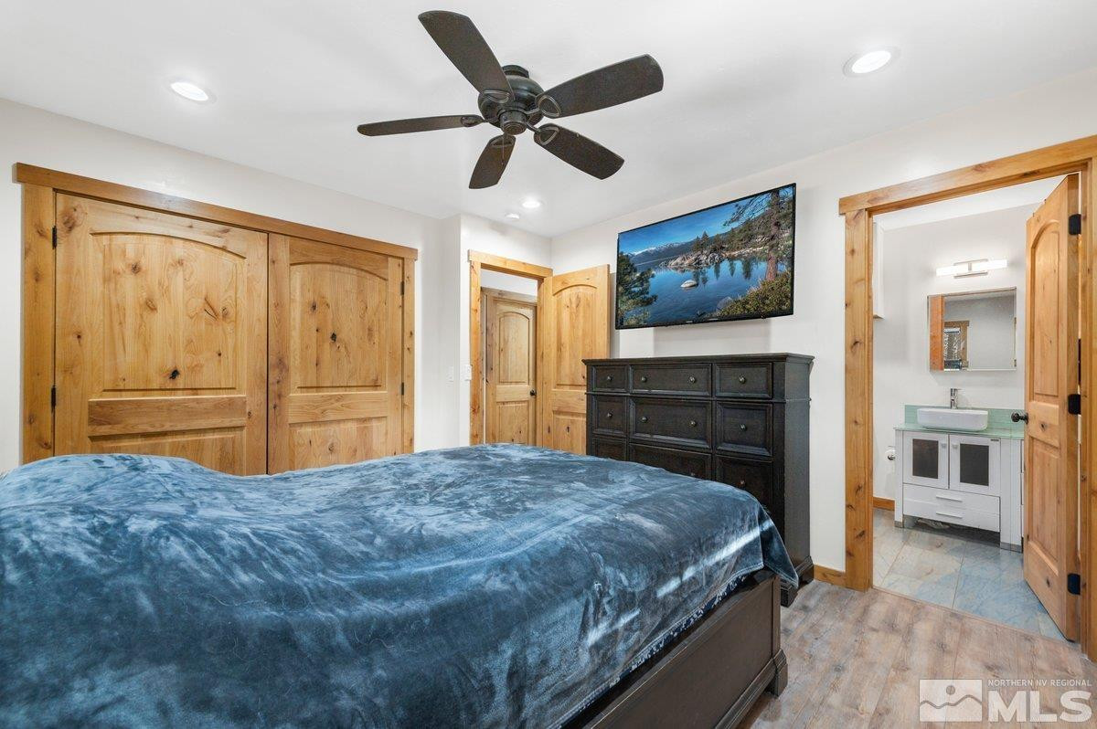 190 Meadow Drive Stateline, NV 89449 - Photo 10 of 26 a bed room with a bed and dresser