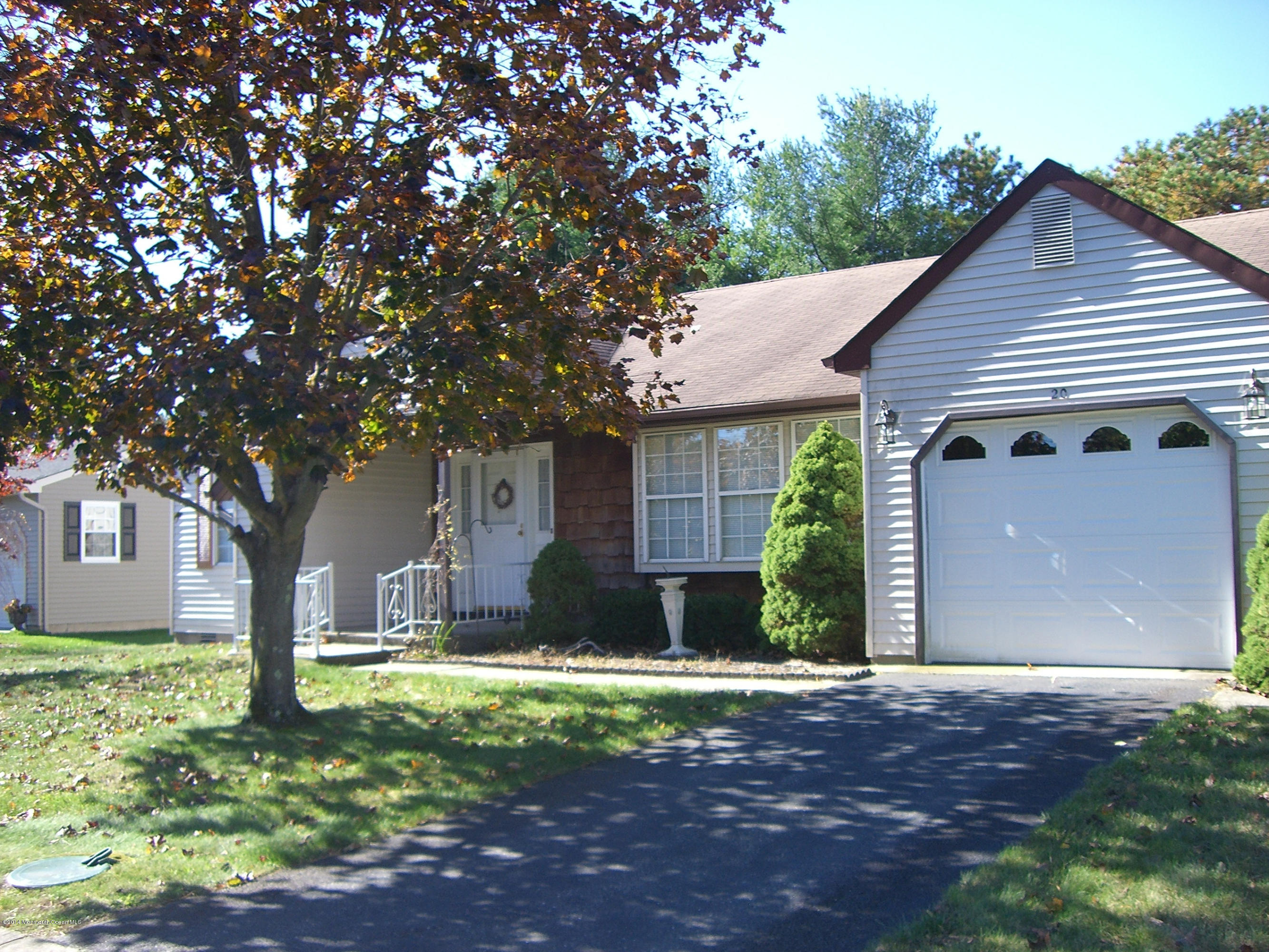 20 Amherst Road Whiting, NJ 08759 - Photo 13 of 37 a front view of a house with a yard