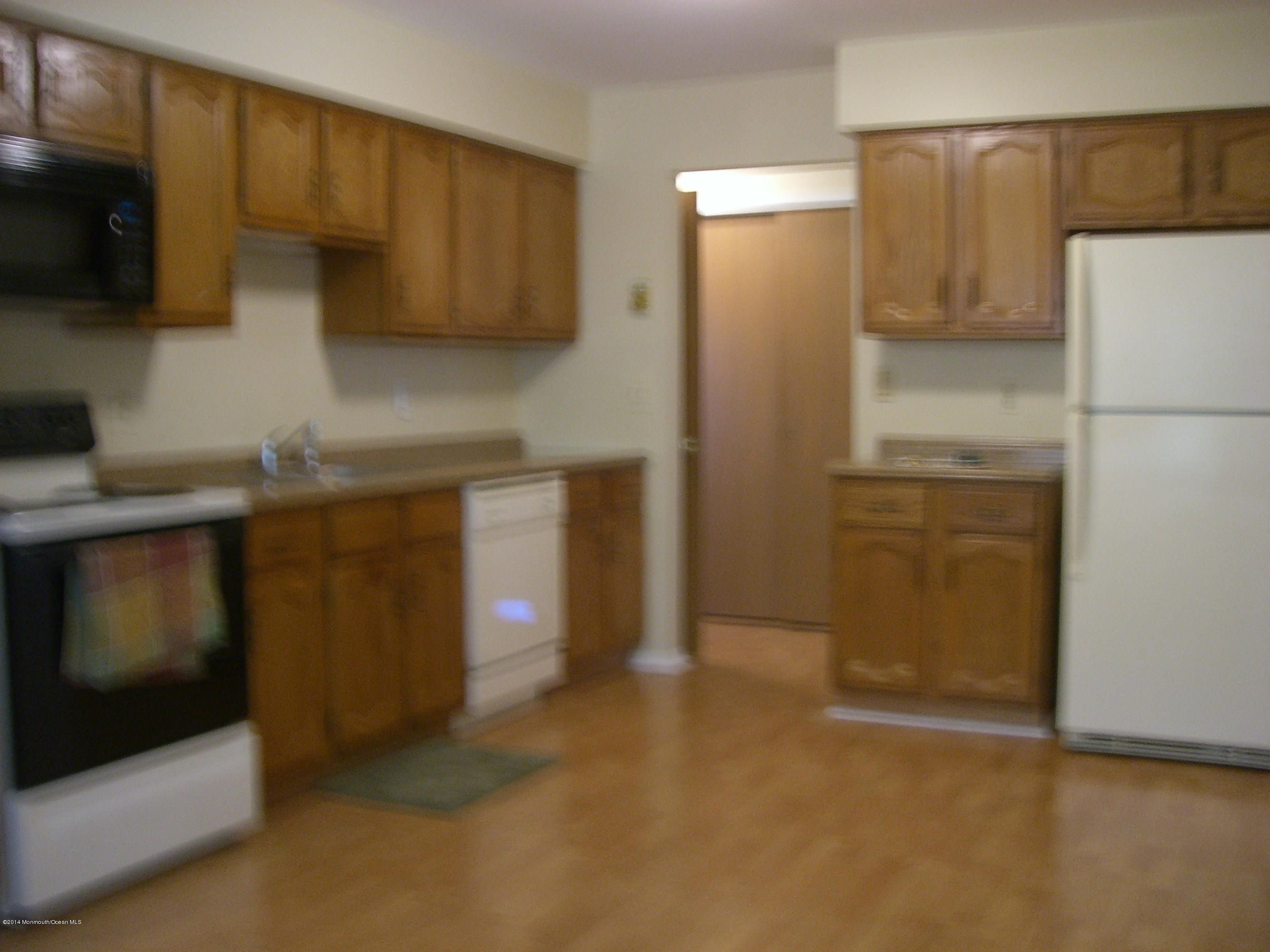 20 Amherst Road Whiting, NJ 08759 - Photo 5 of 37 a kitchen with stainless steel appliances a refrigerator and a stove